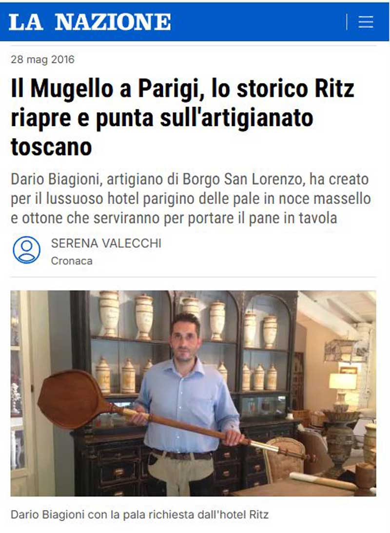 Carpenter Dario Biagioni with the wooden paddle made for the Ritz Paris